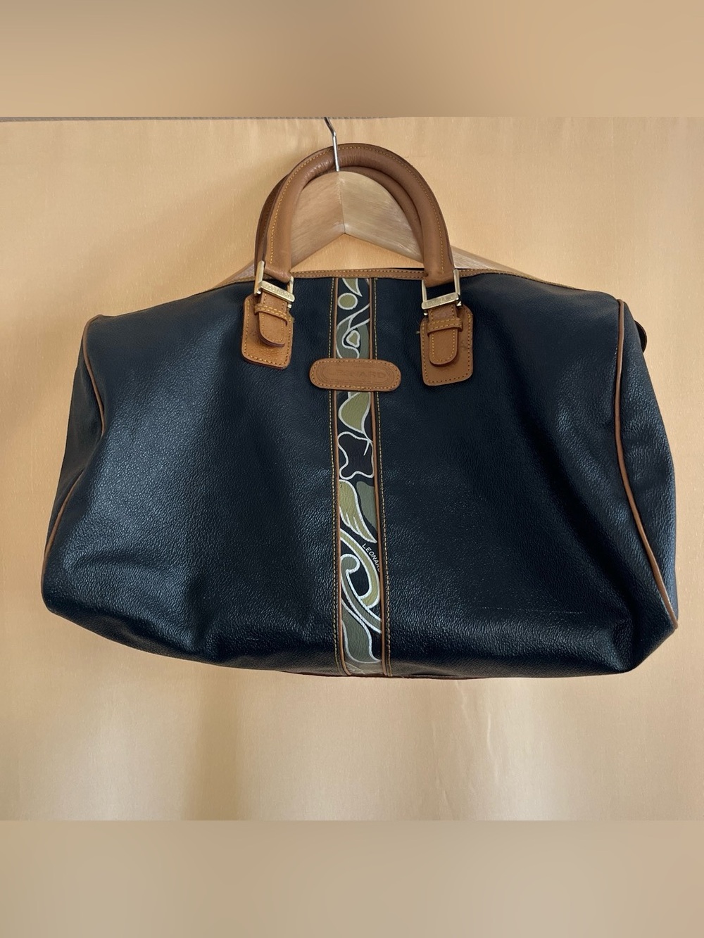 Black Leather Duffel Bag with Brown Trim and Olive Pattern Accent
